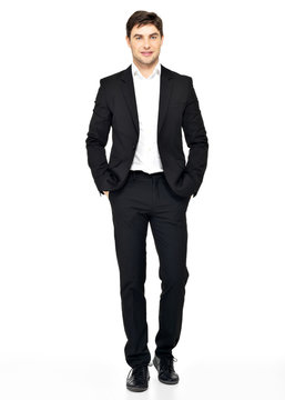 Portrait of smiling businessman in black suit