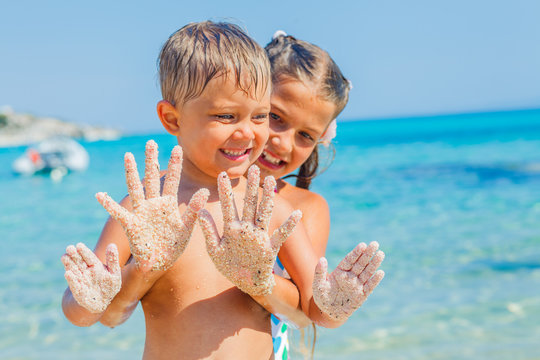 Girl and boy On Sand