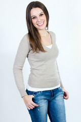 Studio portrait of smiling young nice woman