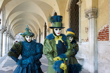 Venetian costume attends Carnival of Venice.