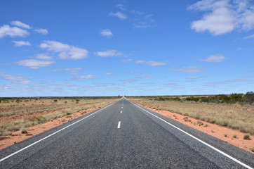 Fototapeta na wymiar A Straight Road in the Austrialian Outback