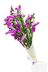 Bouquet from purple statice flowers arrangement centerpiece in v