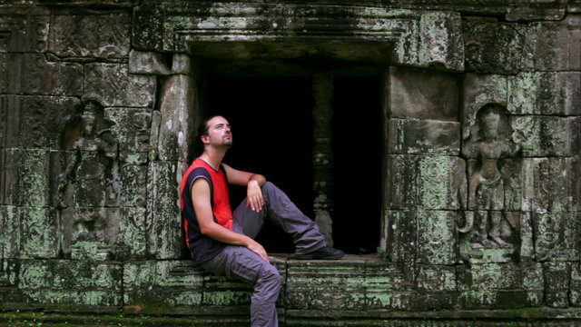 caucasian tourist travel in baphuon temple, angkor, cambodia