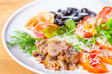 Collage of pub food including cheese burgers