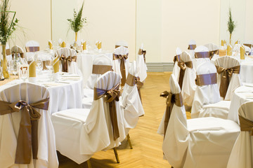 an image of tables setting at a luxury wedding hall