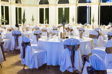 an image of tables setting at a luxury wedding hall