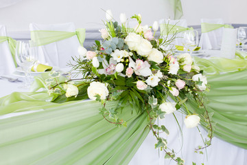 table set for wedding dinner decorated with flowers