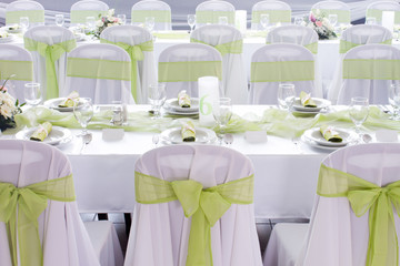 ribbon decoration on wedding chairs cover