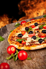 Delicious italian pizza served on wooden table