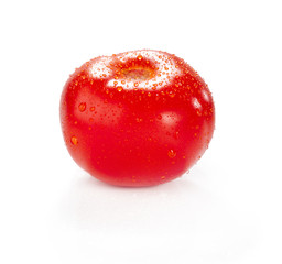 dewy fresh red tomato isolated on white background