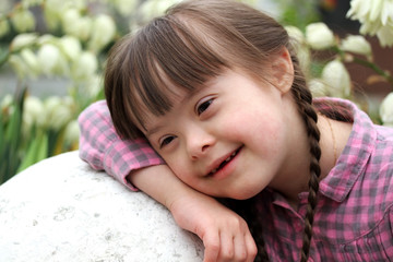 Portrait of beautiful young girl outside