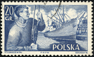 stamp printed in the Poland shows Dock Worker and S. S. Pokoj