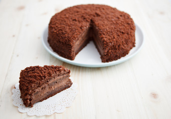 Homemade chocolate blackout cake with a cut piece