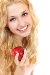 Young happy healthy woman with fresh ripe red apple
