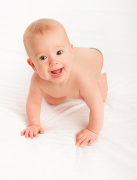 Happy Cute Baby Looking Up On White Background