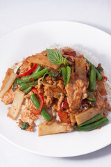 Thai spicy food, stir fried chicken whit basil and rice.