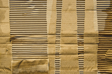 Textured corrugated striped cardboard background