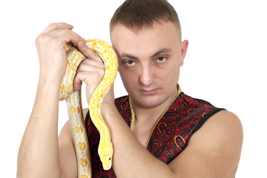 Portrait of man with python snake