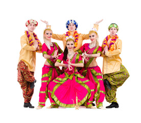 dancers dressed in Indian costumes posing