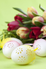 Fototapeta na wymiar Flowery Easter eggs and tulips