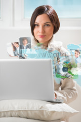 Pretty woman surfing on web with modern laptop