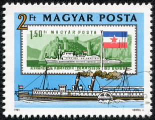 old and new stamps of boats on the Danube River in Budapest