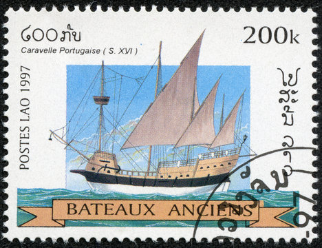 stamp printed in Laos shows image of a sailing ship