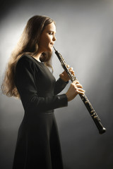 Classical musician oboe musical instrument playing. - obrazy, fototapety, plakaty