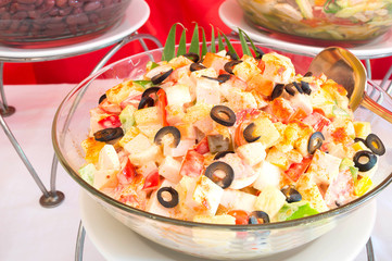 fresh vegetable salad in transparent bowl