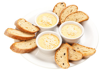 sauce with cheese and bread, isolated on white