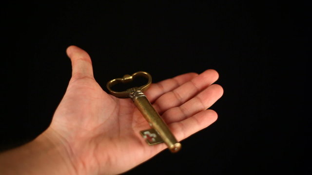 vintage key in hand