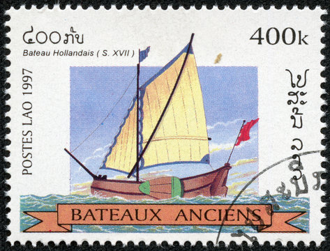 stamp printed in Laos shows image of a sailing ship