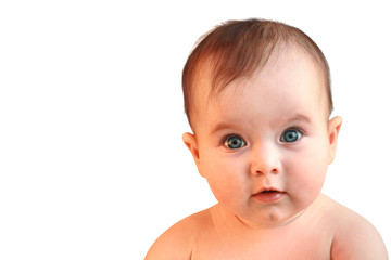 Cute baby girl looking in wide-eyed astonishment