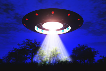 Naklejka premium UFO latające na Ziemi w nocy nad polem