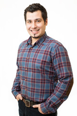Obraz premium Young man in shirt smiling and looking at camera