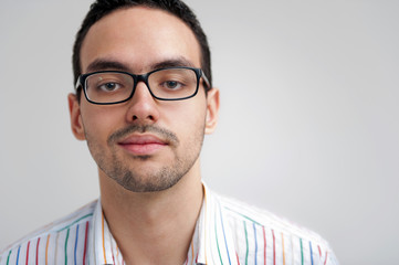Obraz premium Portrait of young man with glasses