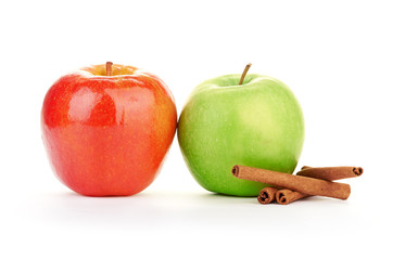 Red and green apples, cinnamon sticks