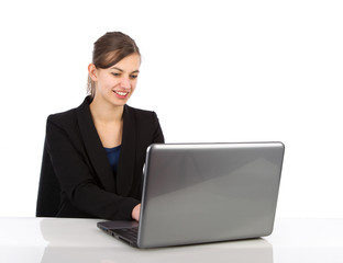 Attractive business woman working on a laptop