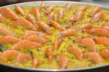 Paella rice with prawns cooked