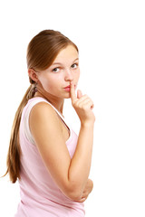 Beautiful woman making silence sign