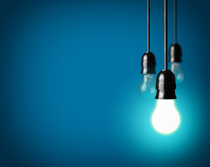 Light bulbs on blue background