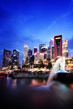 Singapore evening skyline with Merlion statue