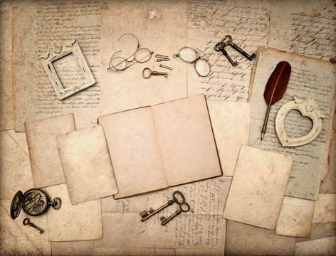 open book, vintage antique accessories and old letters