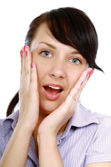 A smiling woman touching her face, isolated on white background