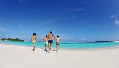 group of happy young people have fun on bach