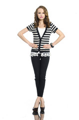 Fototapeta premium Full body young woman in stripy t-shirt and jeans