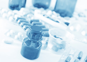 color pills and medical bottle