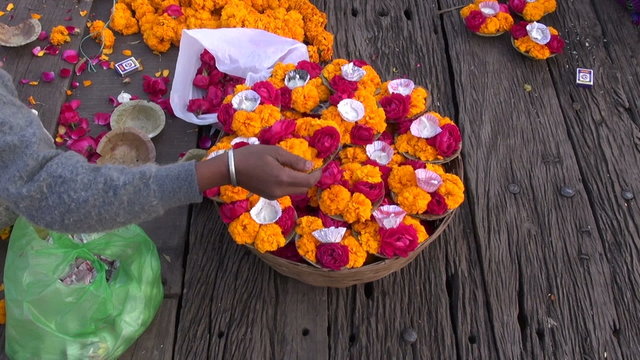 hindu sacred ceremony puja flowers on old  table