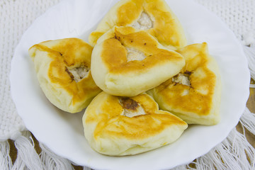 hot patties with meat on a dish