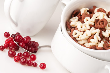 Alphabet cereal with ripe сranberries